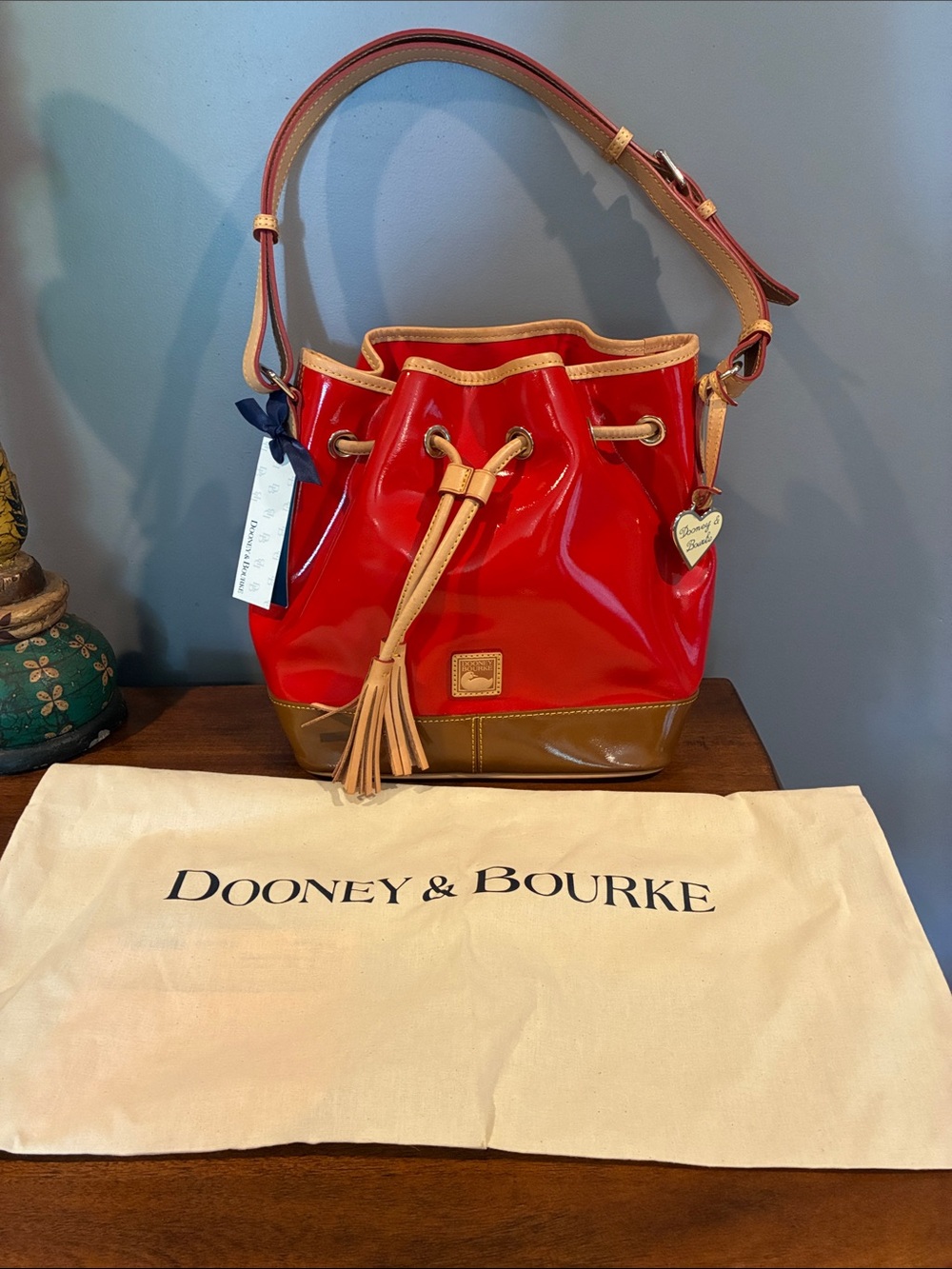 Dooney & Bourke Red Patent Leather Drawstring Shoulder Bucket Bag with Tan Trim